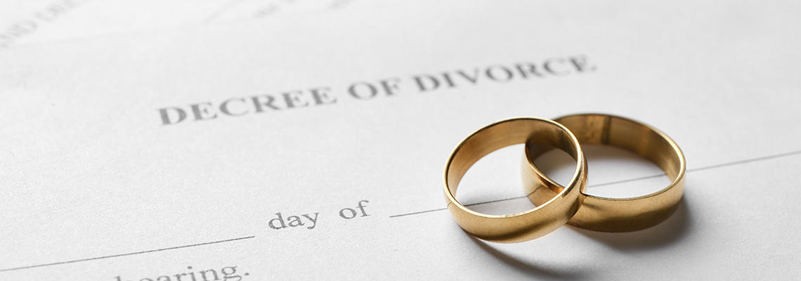 Rings with decree of divorce on a table
