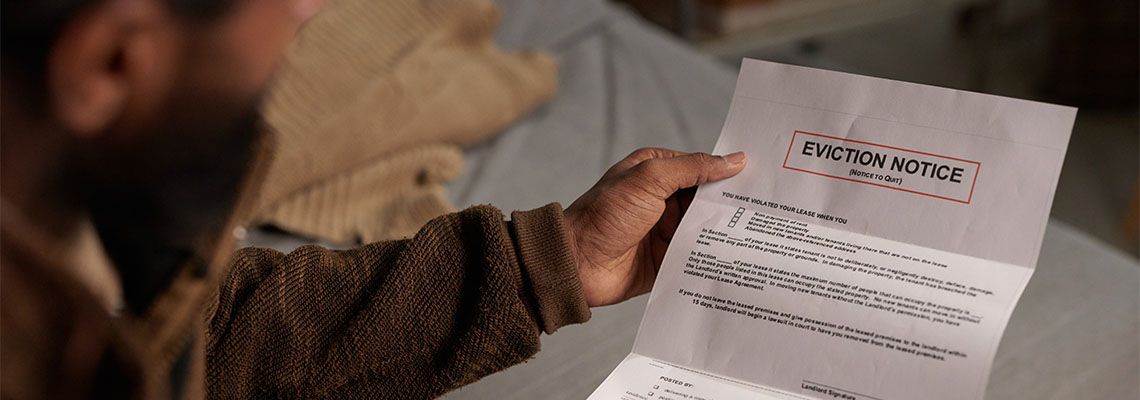 Man reading eviction notice