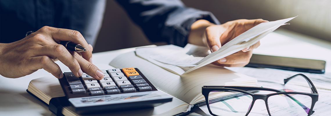Young Woman Checking Bills, Taxes, Bank Account Balance