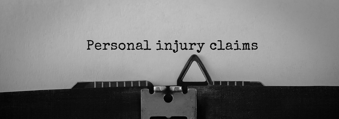 Text Personal Injury Claims Typed on Retro Typewriter