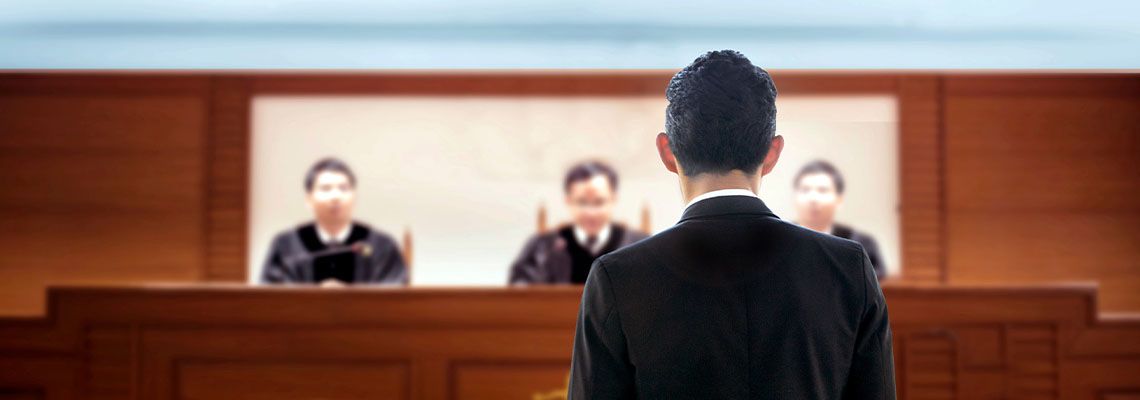 court attorney lawyer talking to magistrate in courtroom