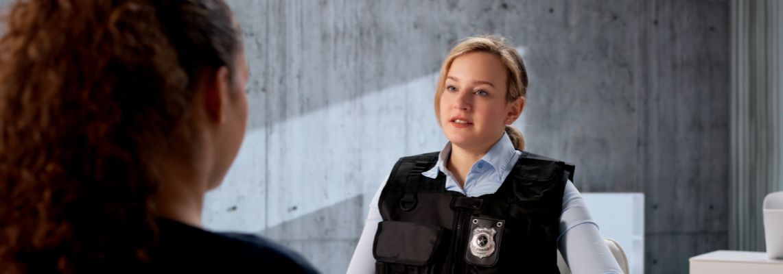 Police Investigator Conducts an Intense Interrogation