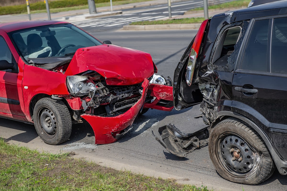 red car hit black car in the rear