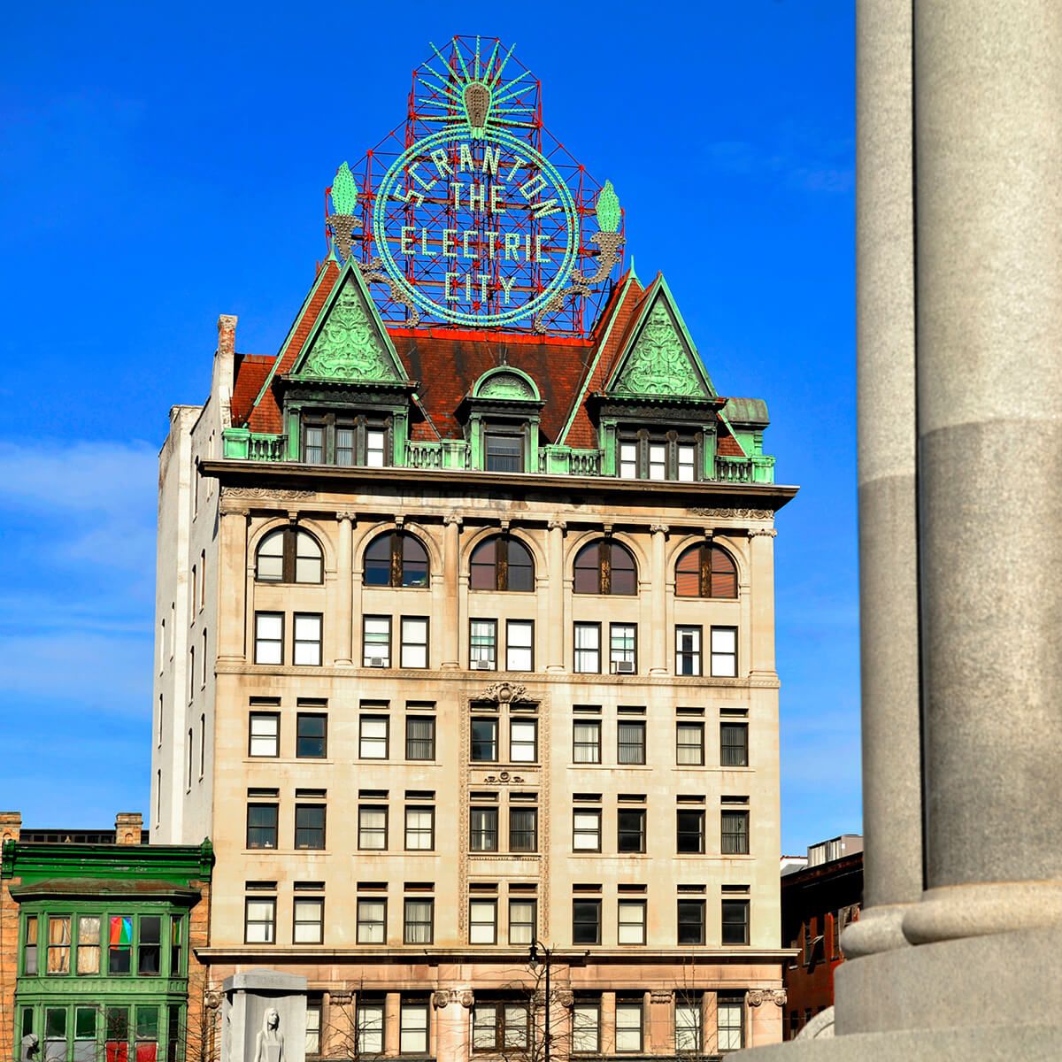 Sign saying "Scranton the Electric City" on a building