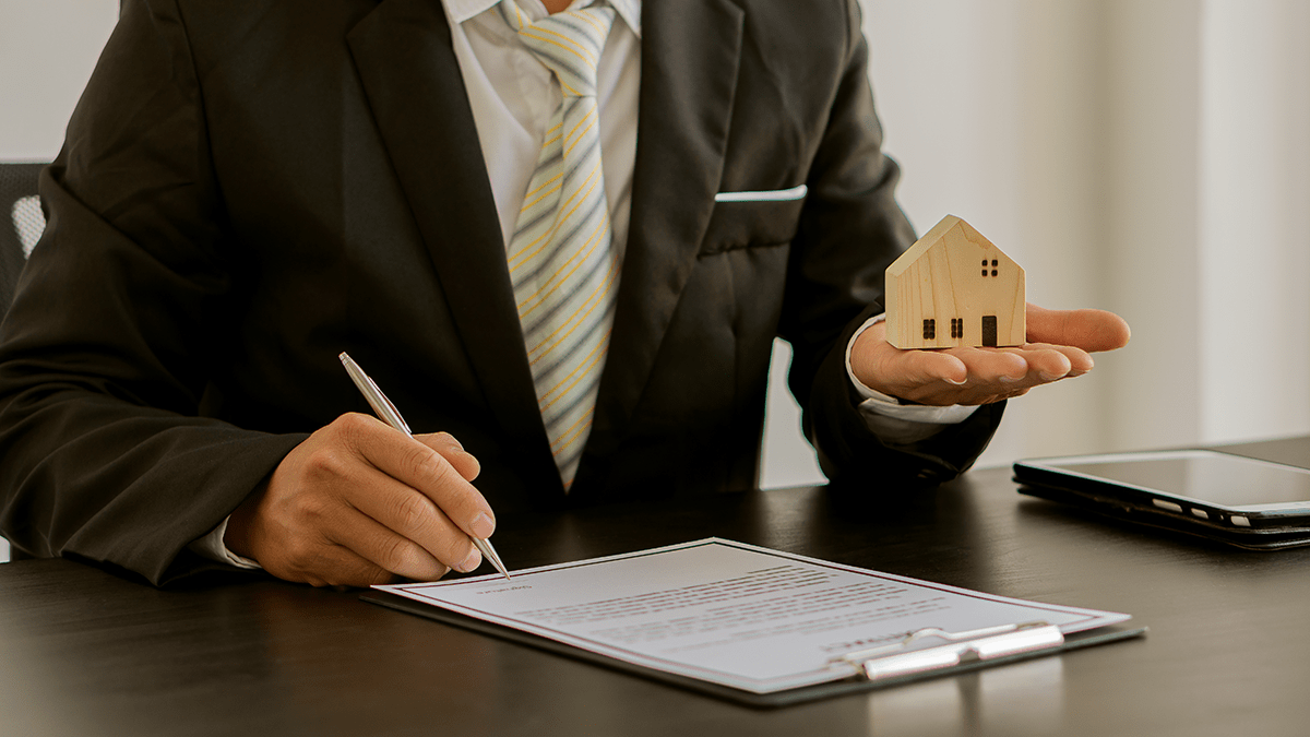 Real estate agents provide advice on renting or buying a home in the office