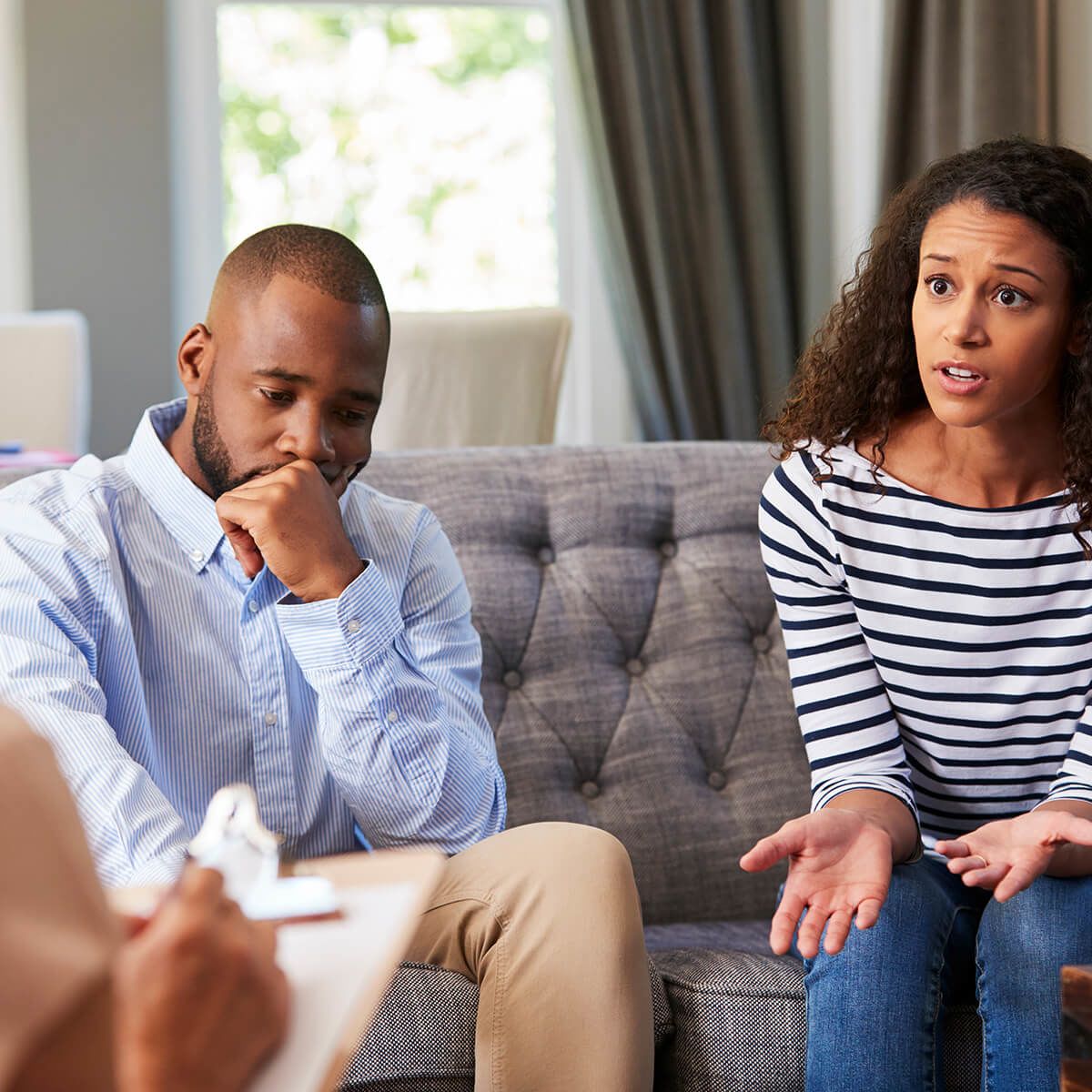 Couple talking to a therapist or mediator