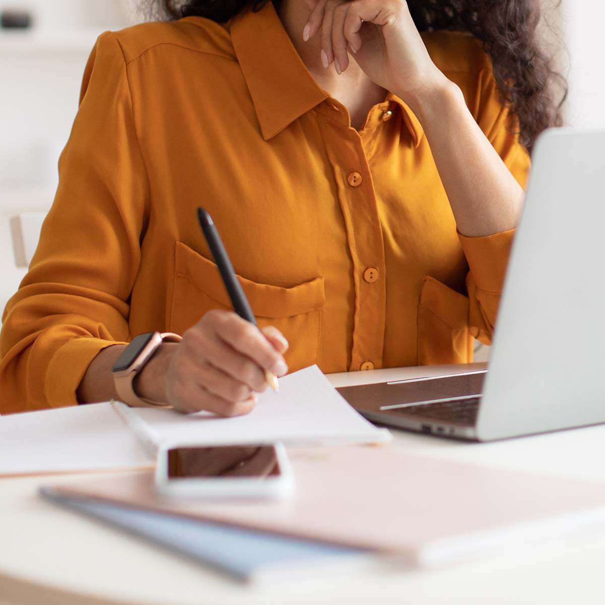 A woman at her desk working