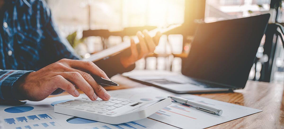 Man doing his taxes at a computer