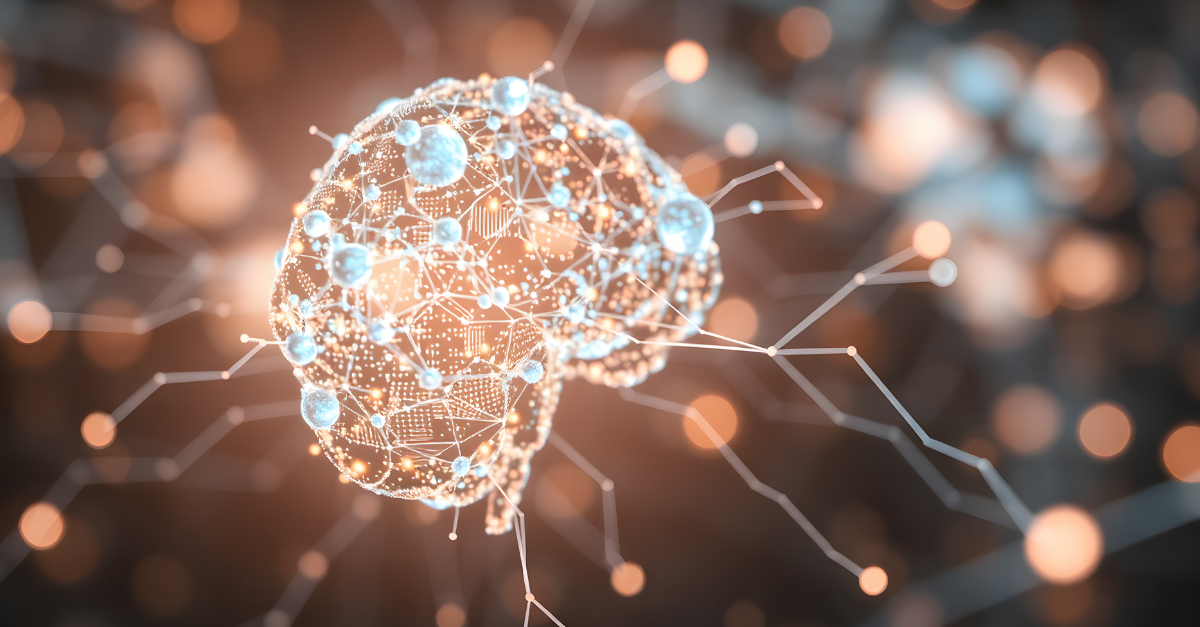 A brain that is glowing and hooked up to wires to represent Artificial Intelligence