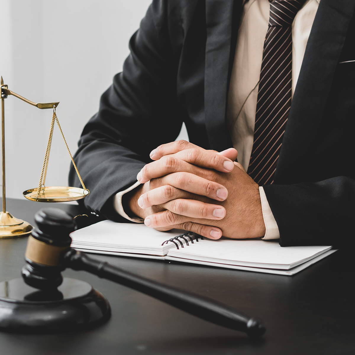 attorney closeup, gavel, justice lady, paper on table