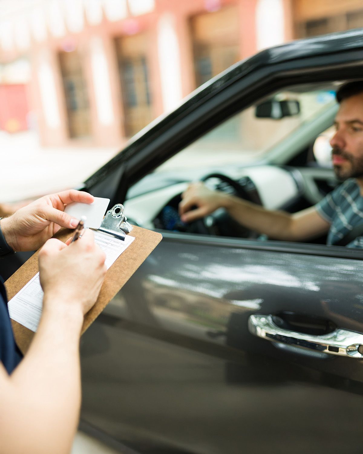 A man getting a ticket for reckless driving