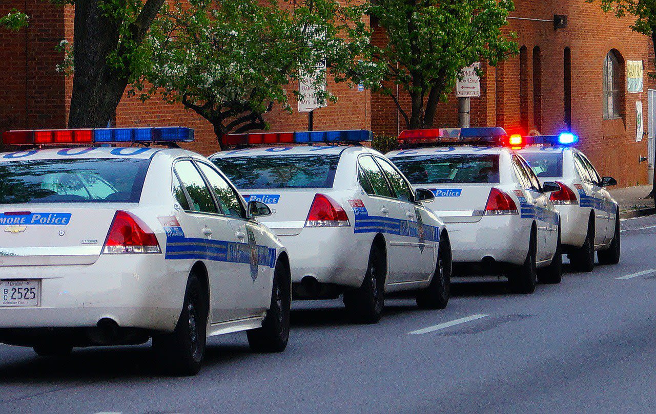 4 police cars lined up