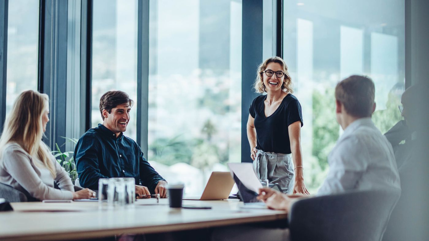 Business people having casual discussion during meeting