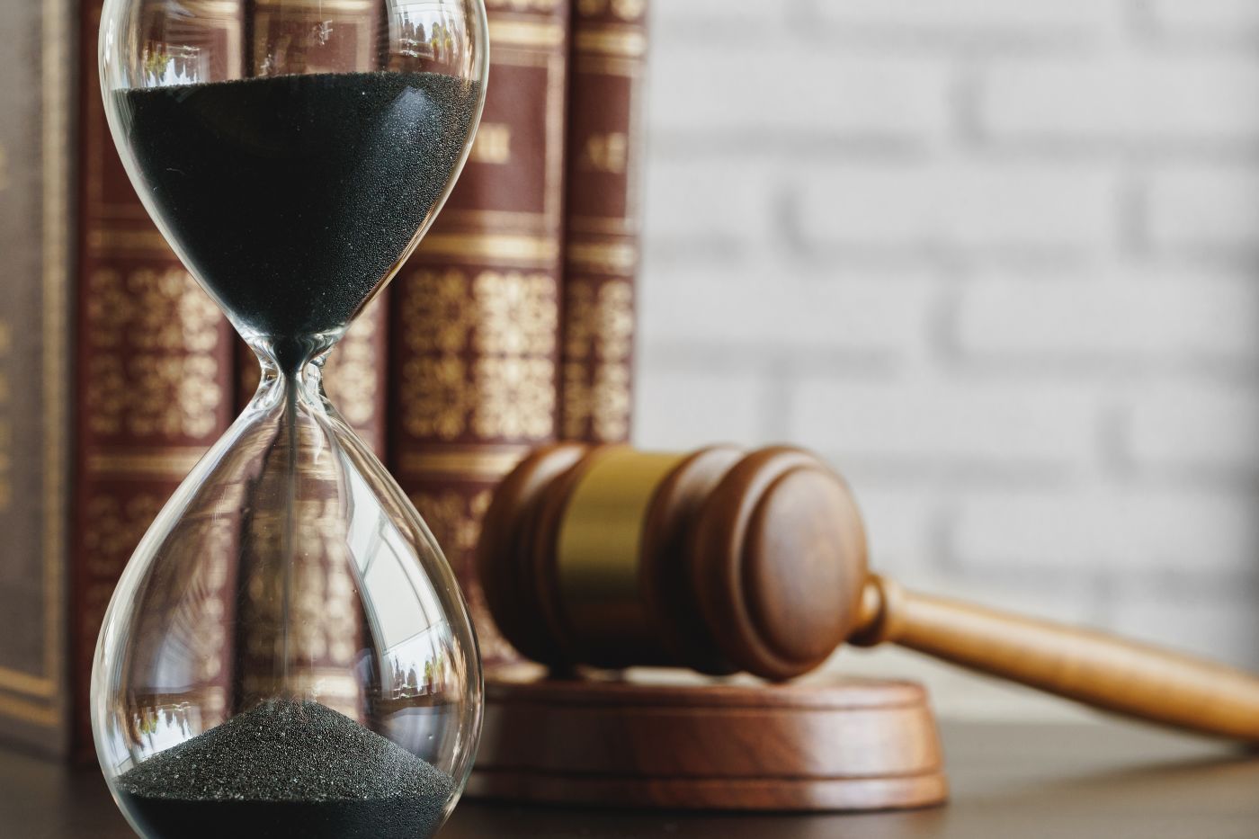 Gavel next to hourglass