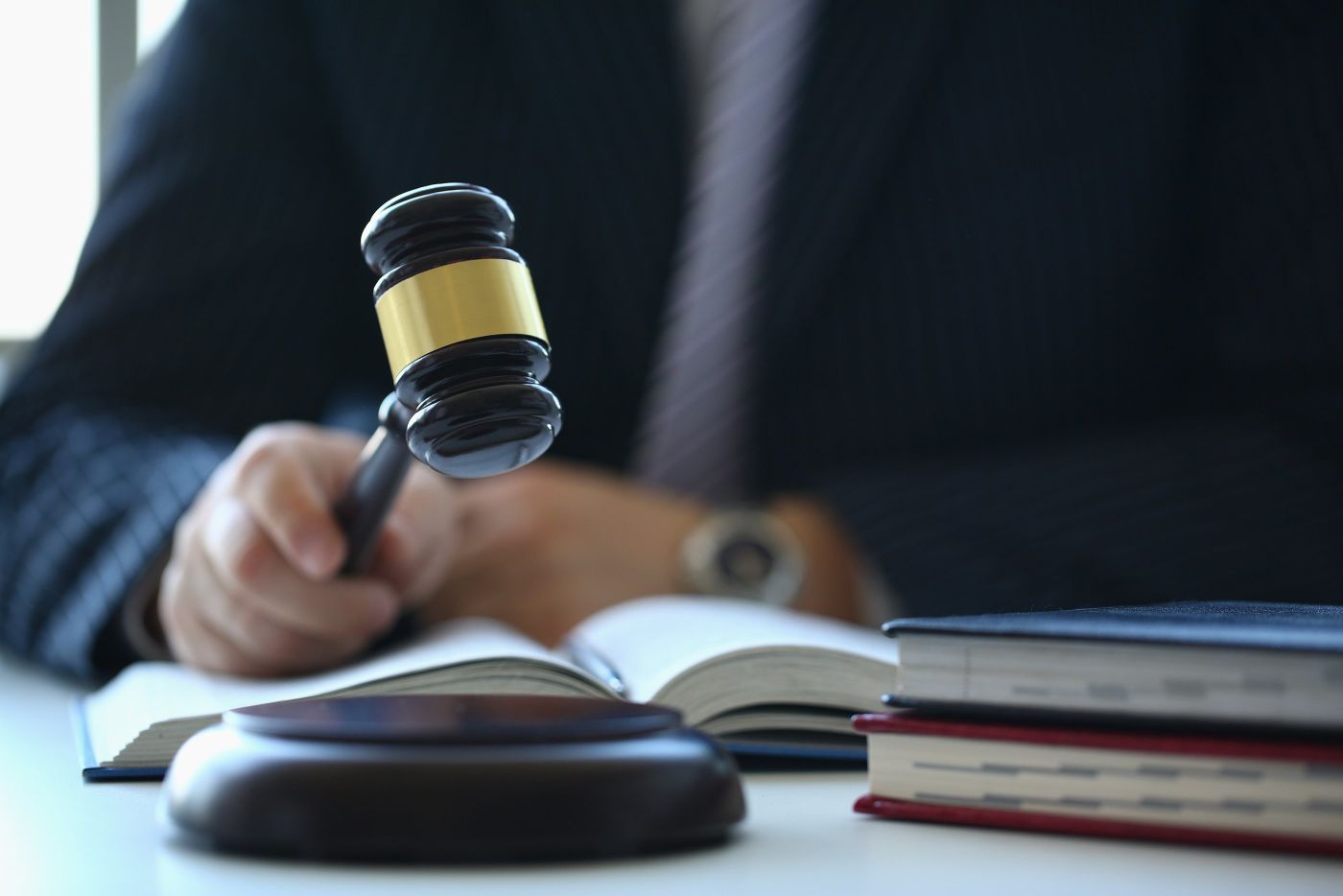 Male judge holding gavel