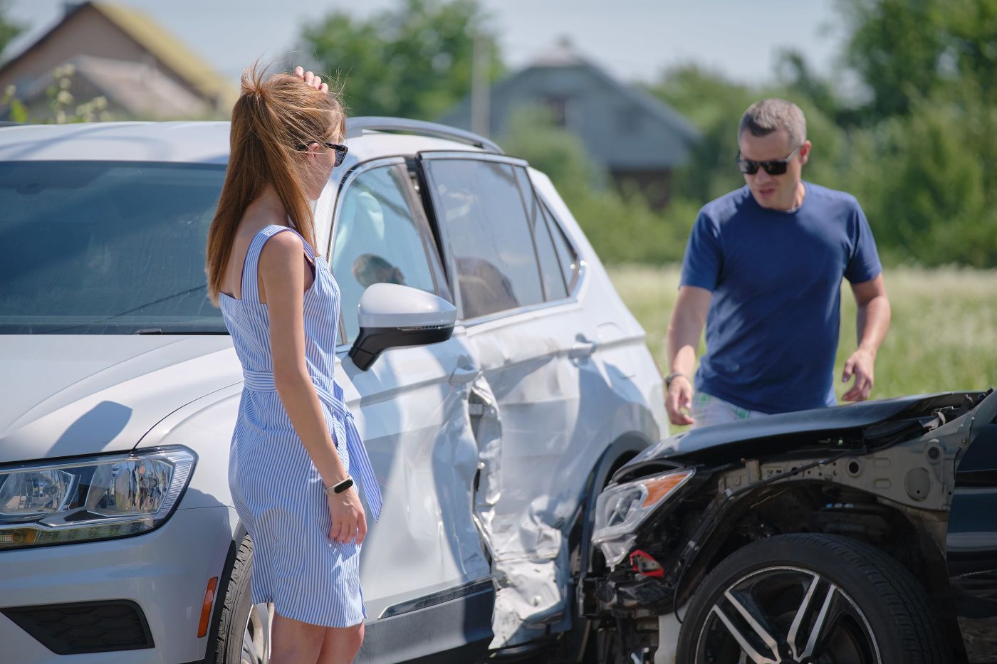 man and women after car accident