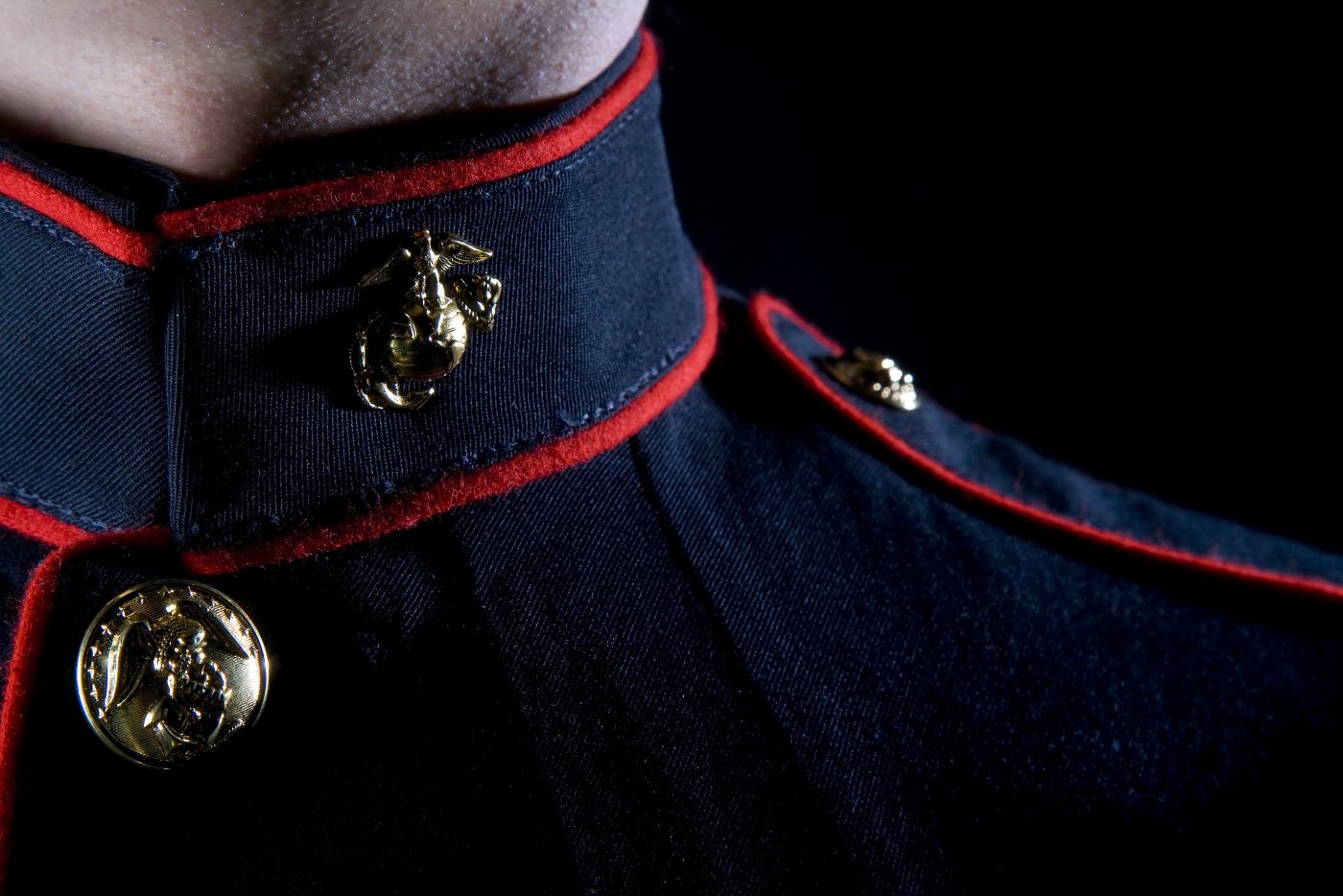 the neck of a Marine in dress blues