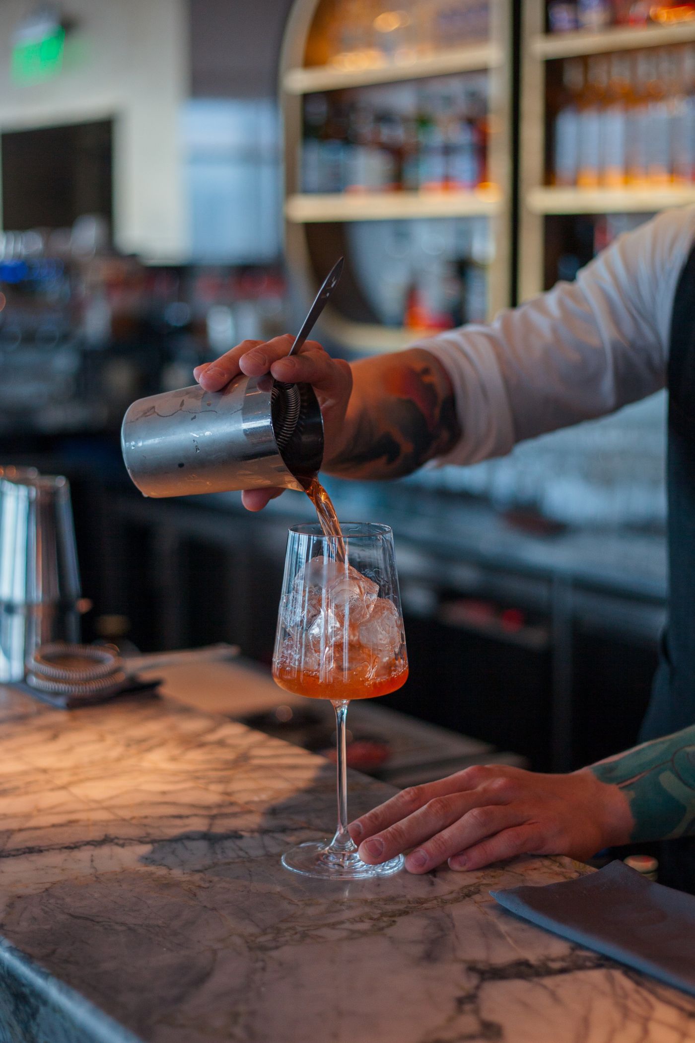 bartender pouring a drink