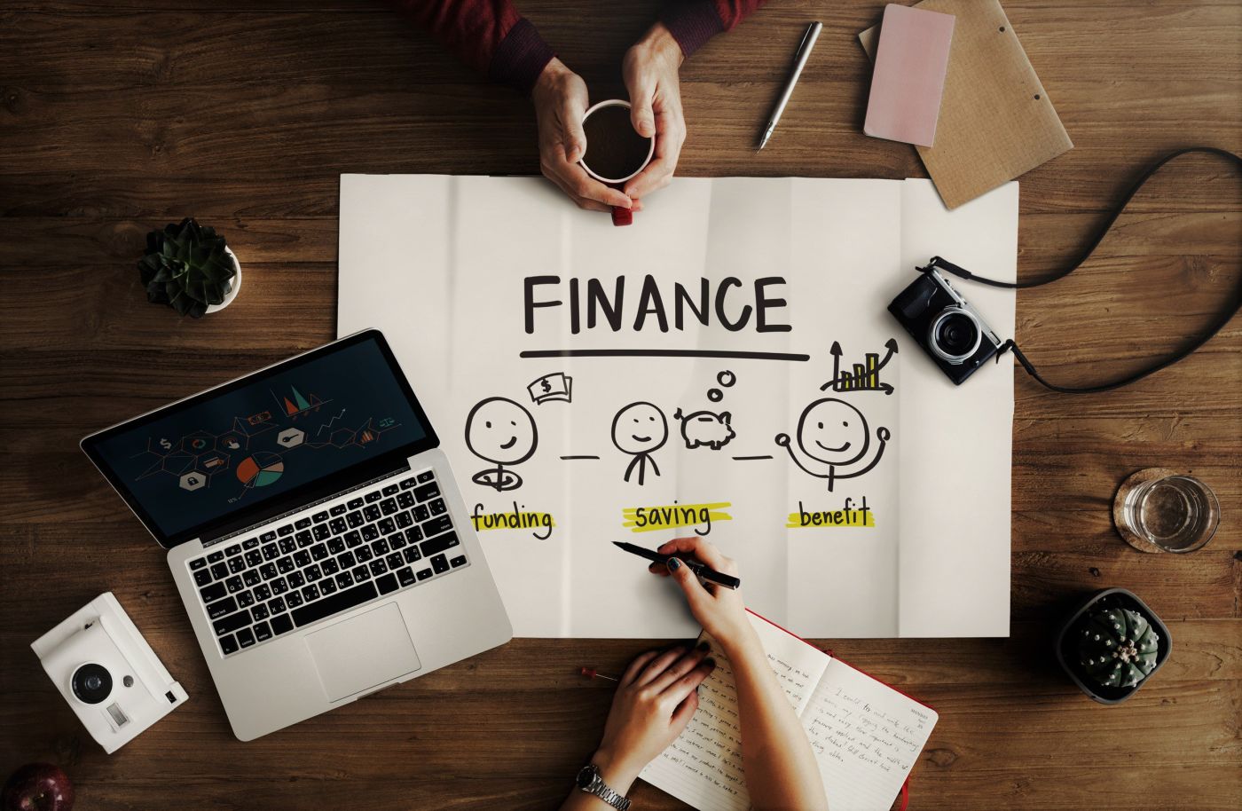 Word "Finance" Written on a Paper