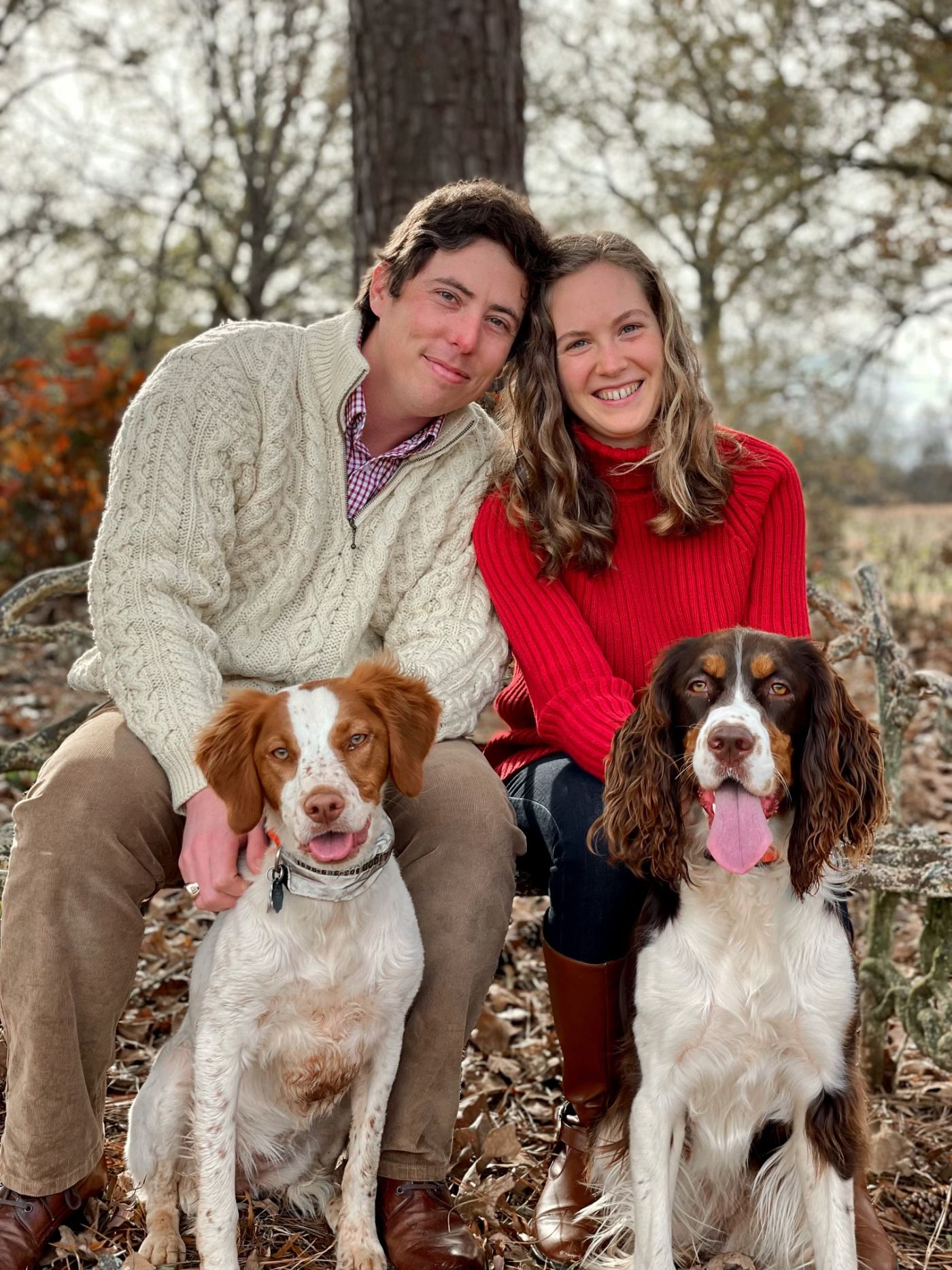 Picture of George with his wife and two dogs