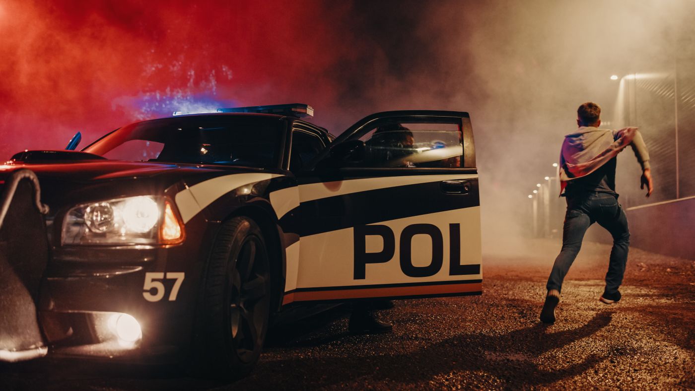 Man running away from police