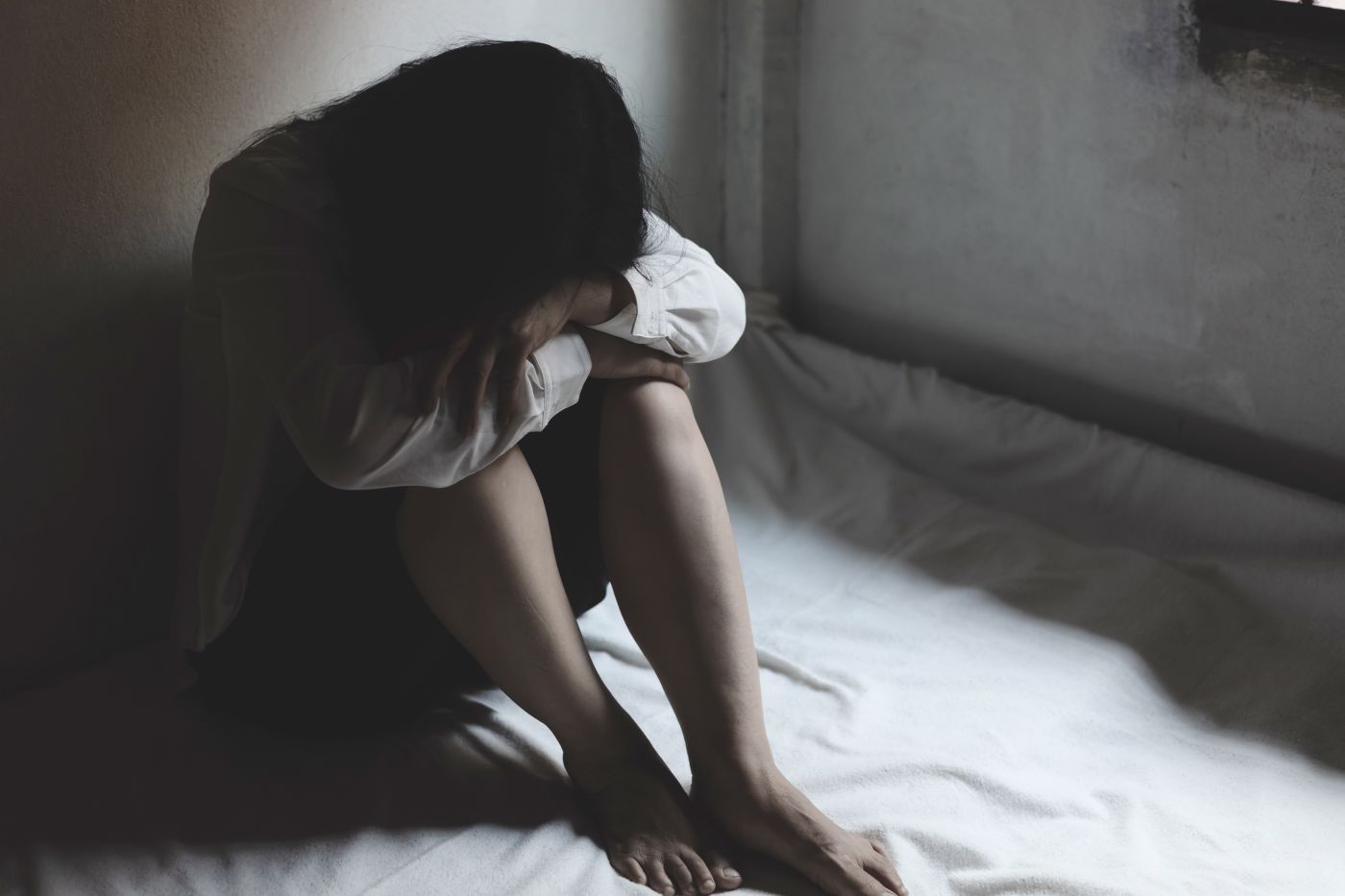 Crying women in dark background
