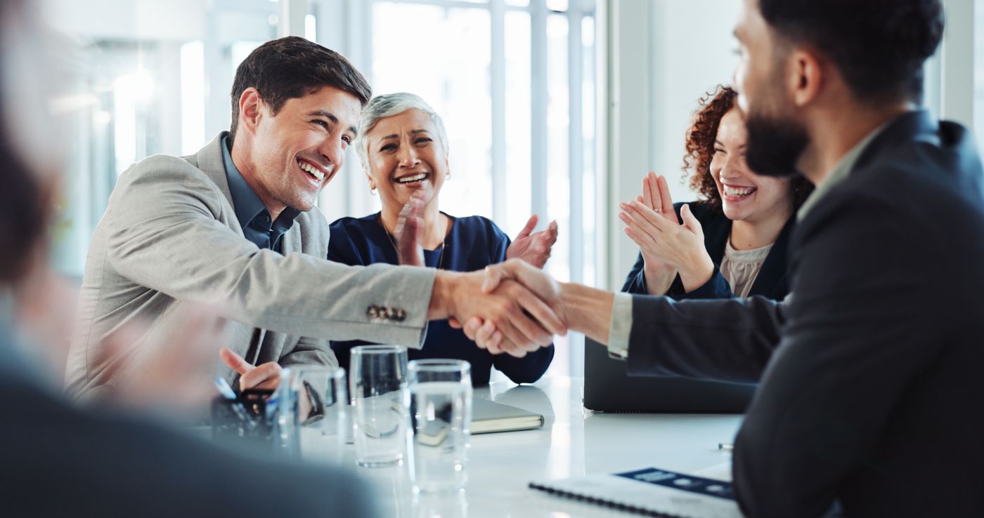 Businessmen shaking hands after agreement