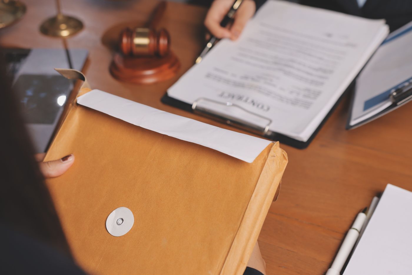 A lawyer holding a file