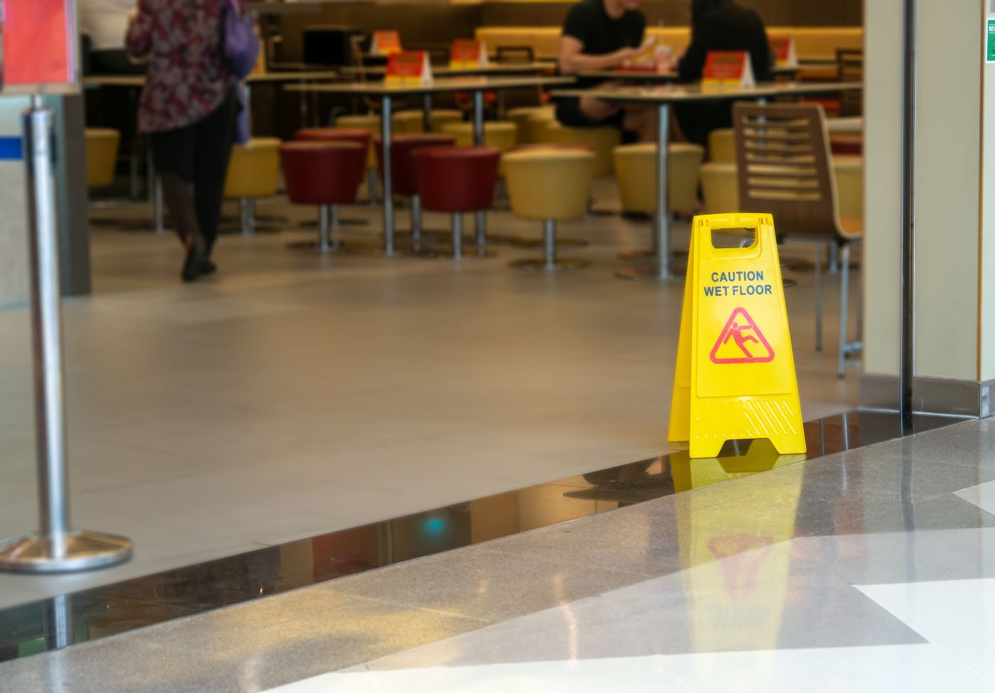 Wet floor sign in restaurant