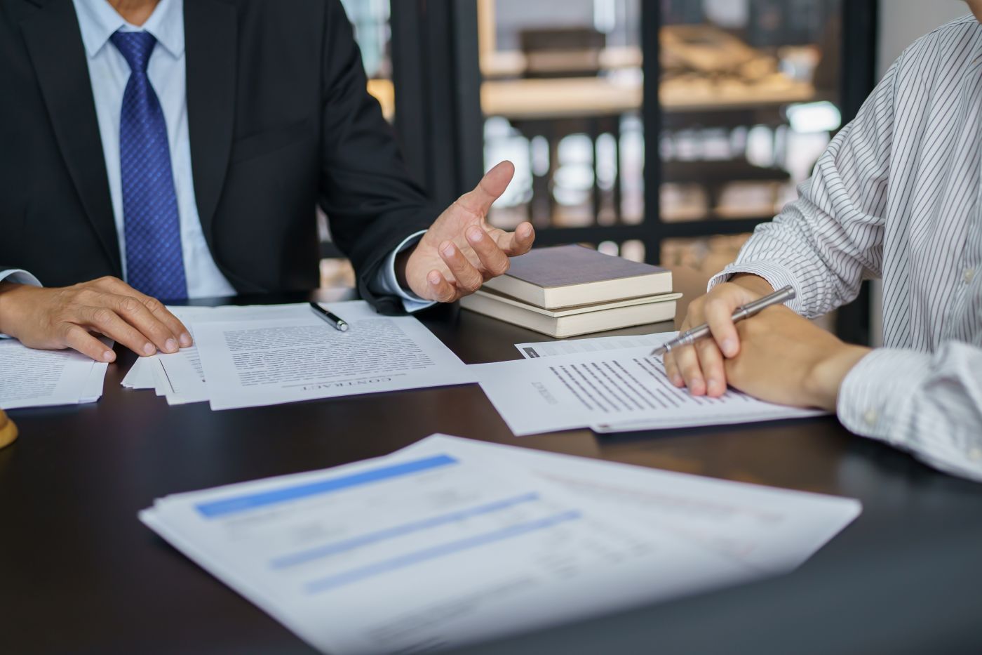 Businessman consulting with attorney