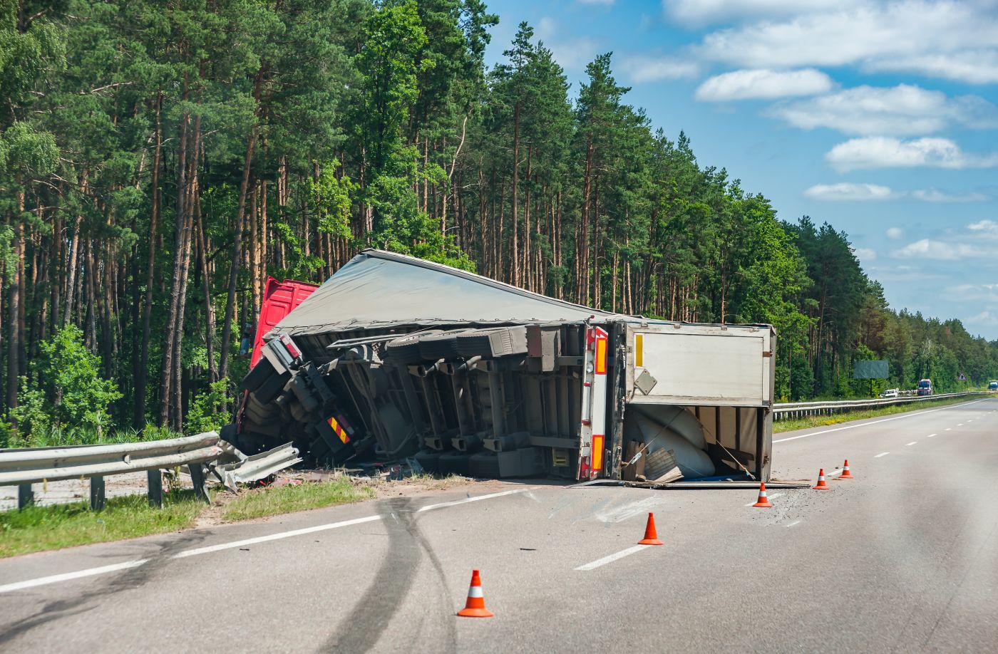 Rollover truck on highway