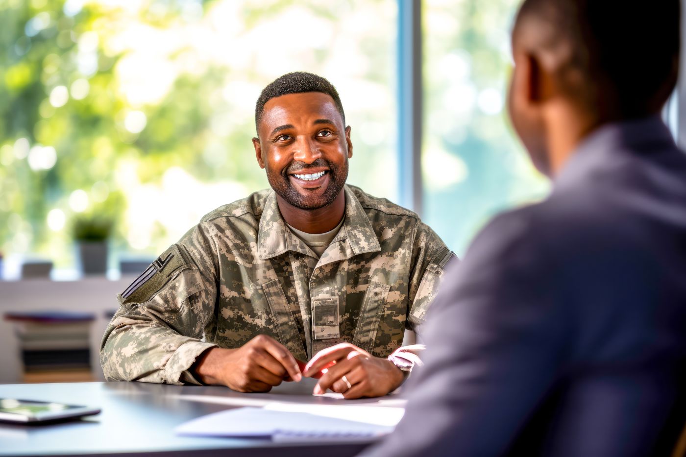 American male veteran consulting with advisor for future planning