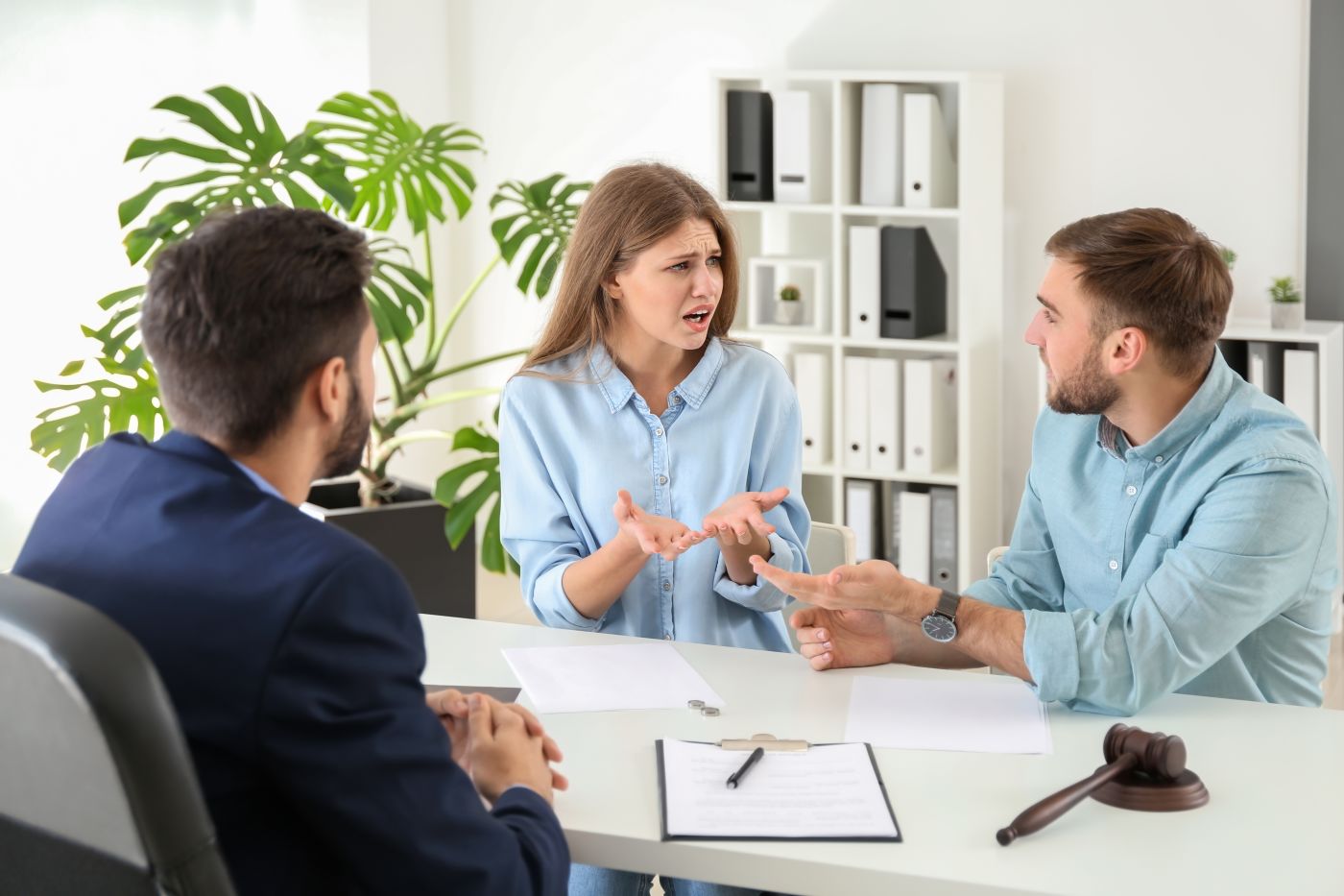 Couple visiting divorce lawyer in office