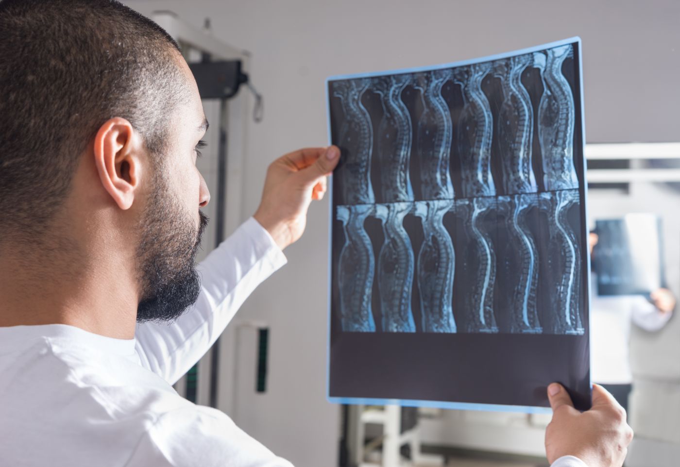 Doctor Analyzing Xray of Spinal Cord