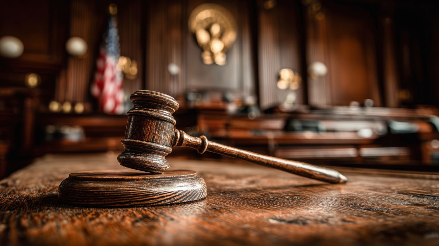 Gavel rests on courtroom desk