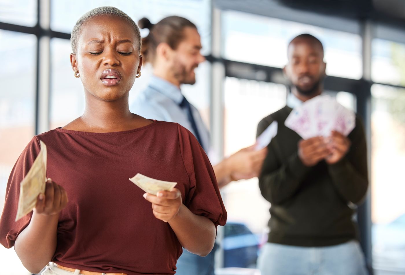 Unhappy female with her paycheck