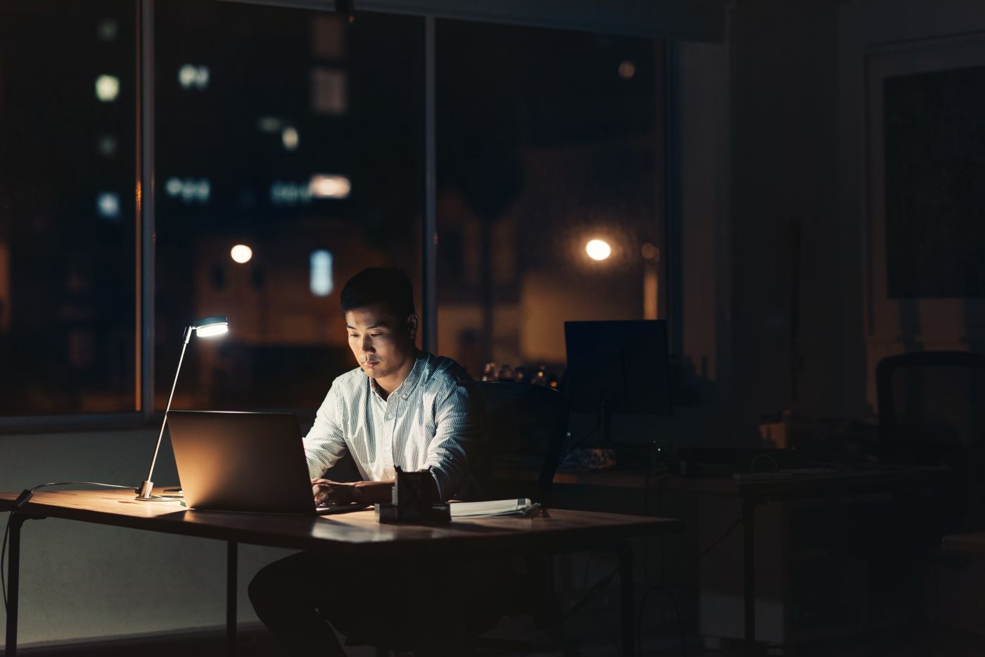 Man working late night at office