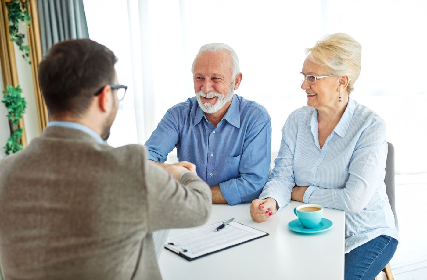 Elderly couples meeting attorney for estate plan consultation