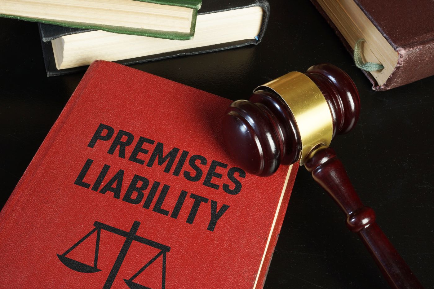 Premises Liability law book and gavel on table