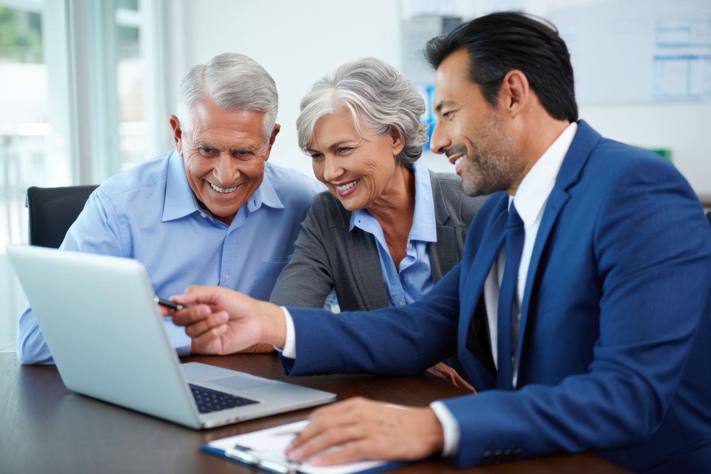 Senior couple discussing estate planning with professional