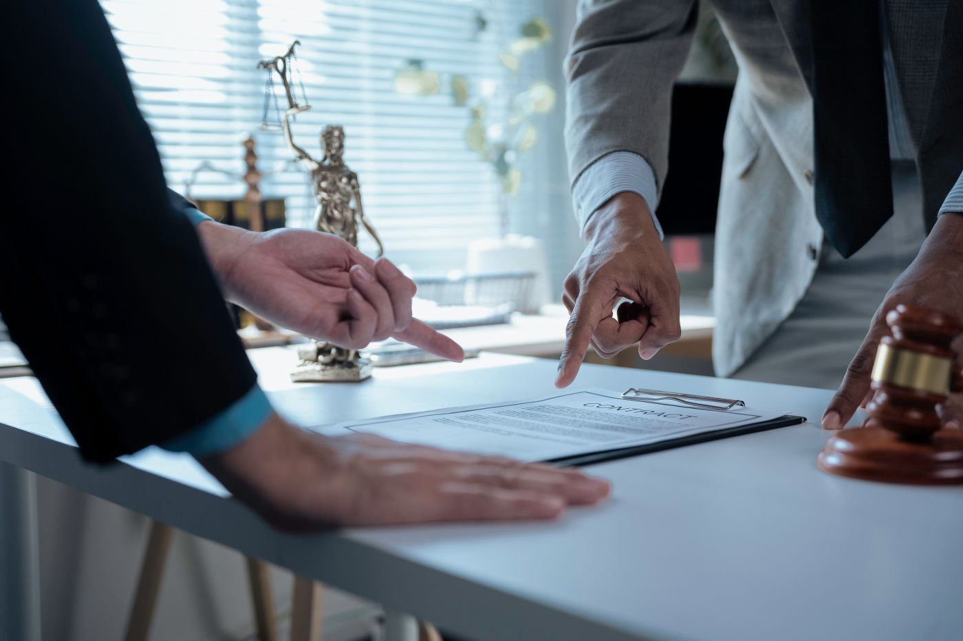 Attorney and client discussing contract term