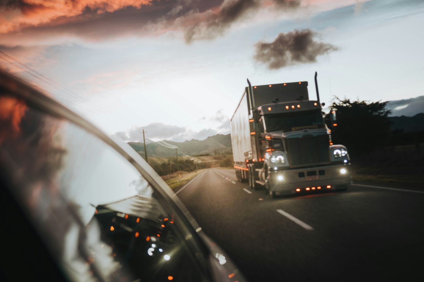 Trucking evening scene on highway