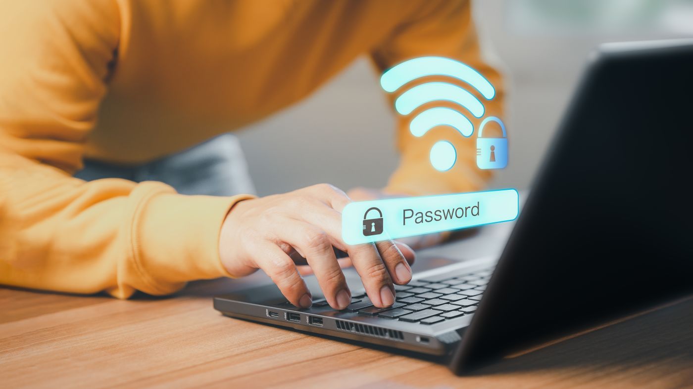 Man connecting to wifi in his laptop