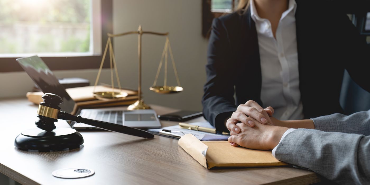 Attorney consoling solution to her client