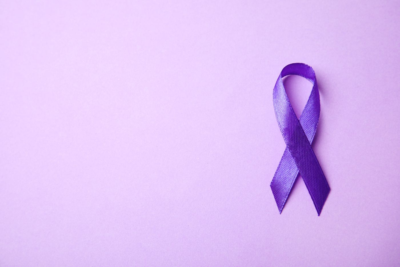 Purple ribbon representing Domestic violence awareness