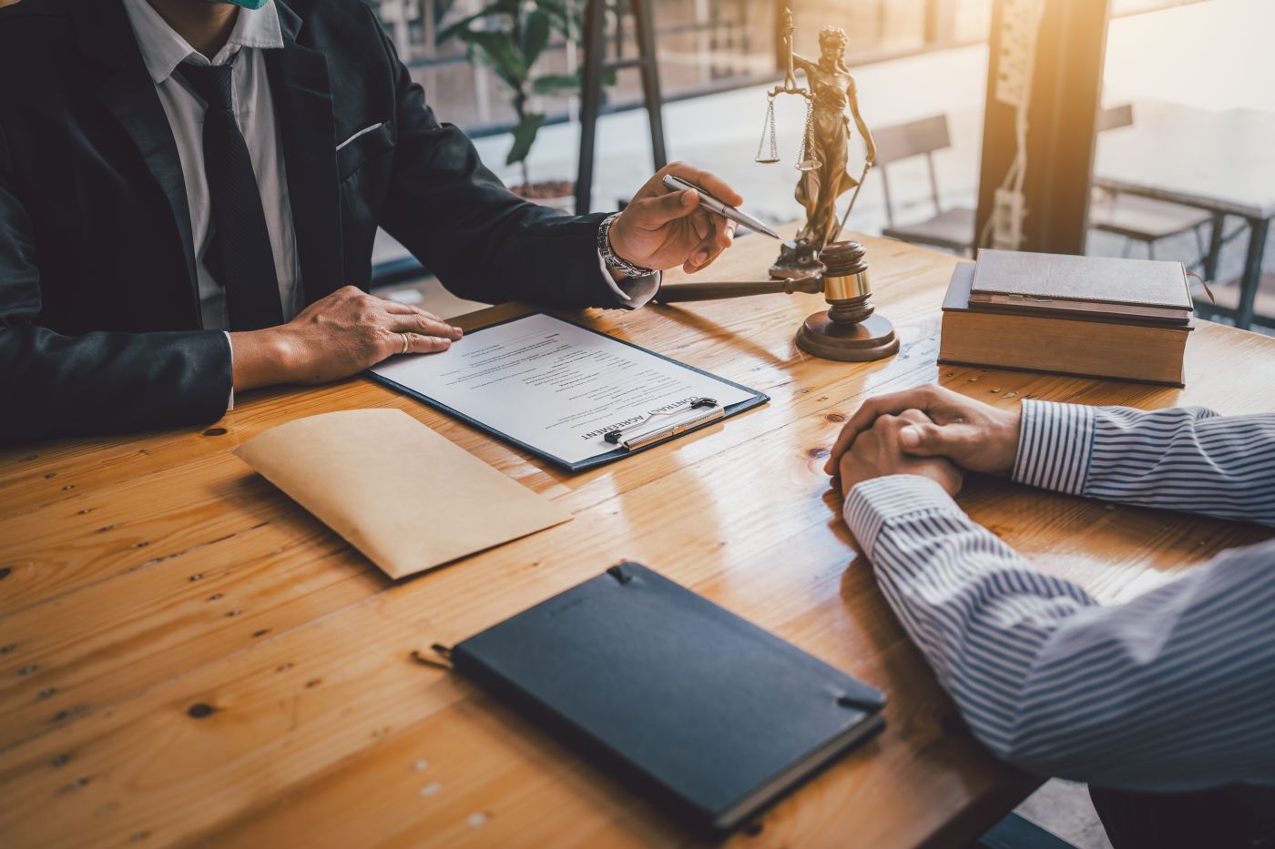 Attorney providing legal consultation to client