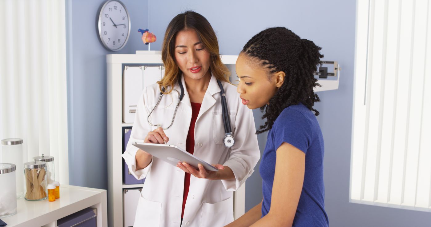 Patient consulting with a doctor