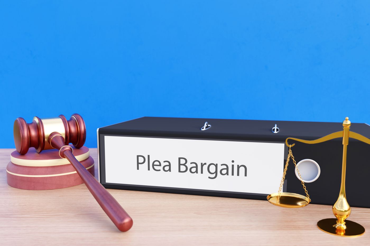 Folder with Plea Bargain label and gavel on table