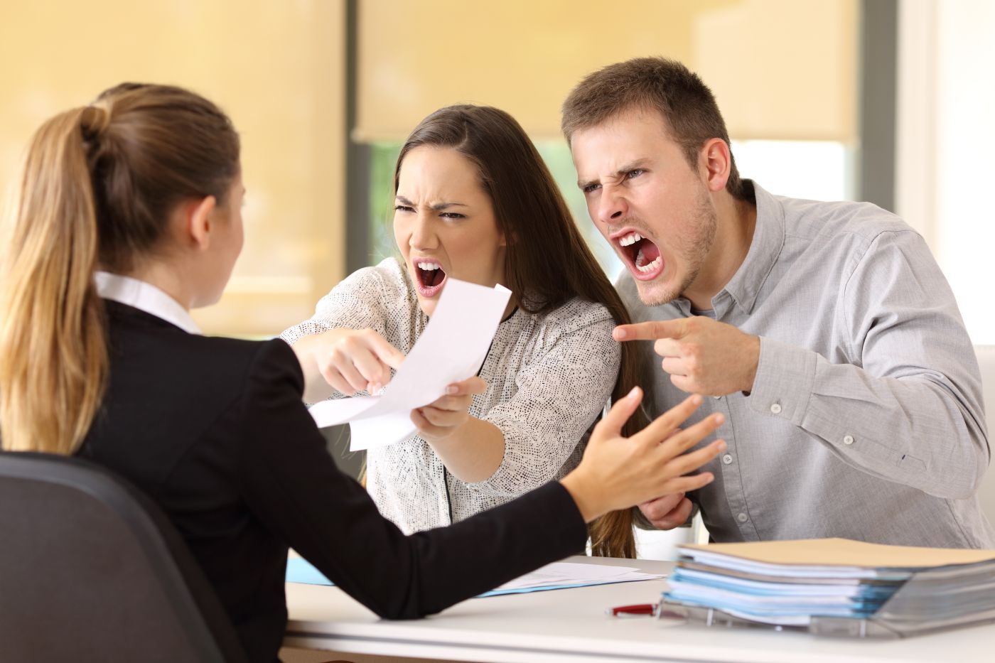 Angry couple at insurance office