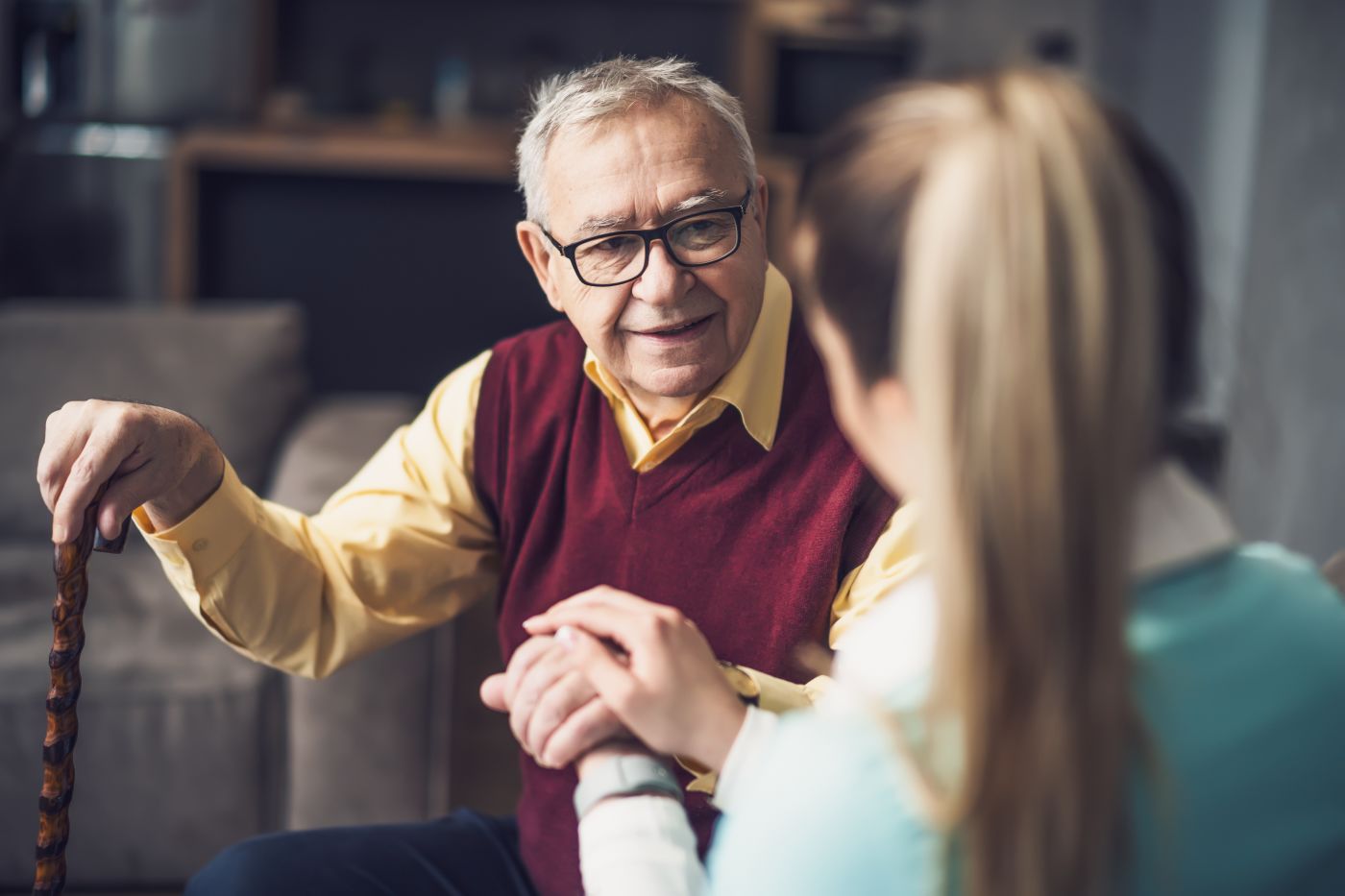 Medical person looking after an old man